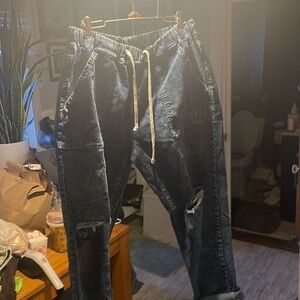 Balloon drawstring jeans with pockets and holes in knees size extra large